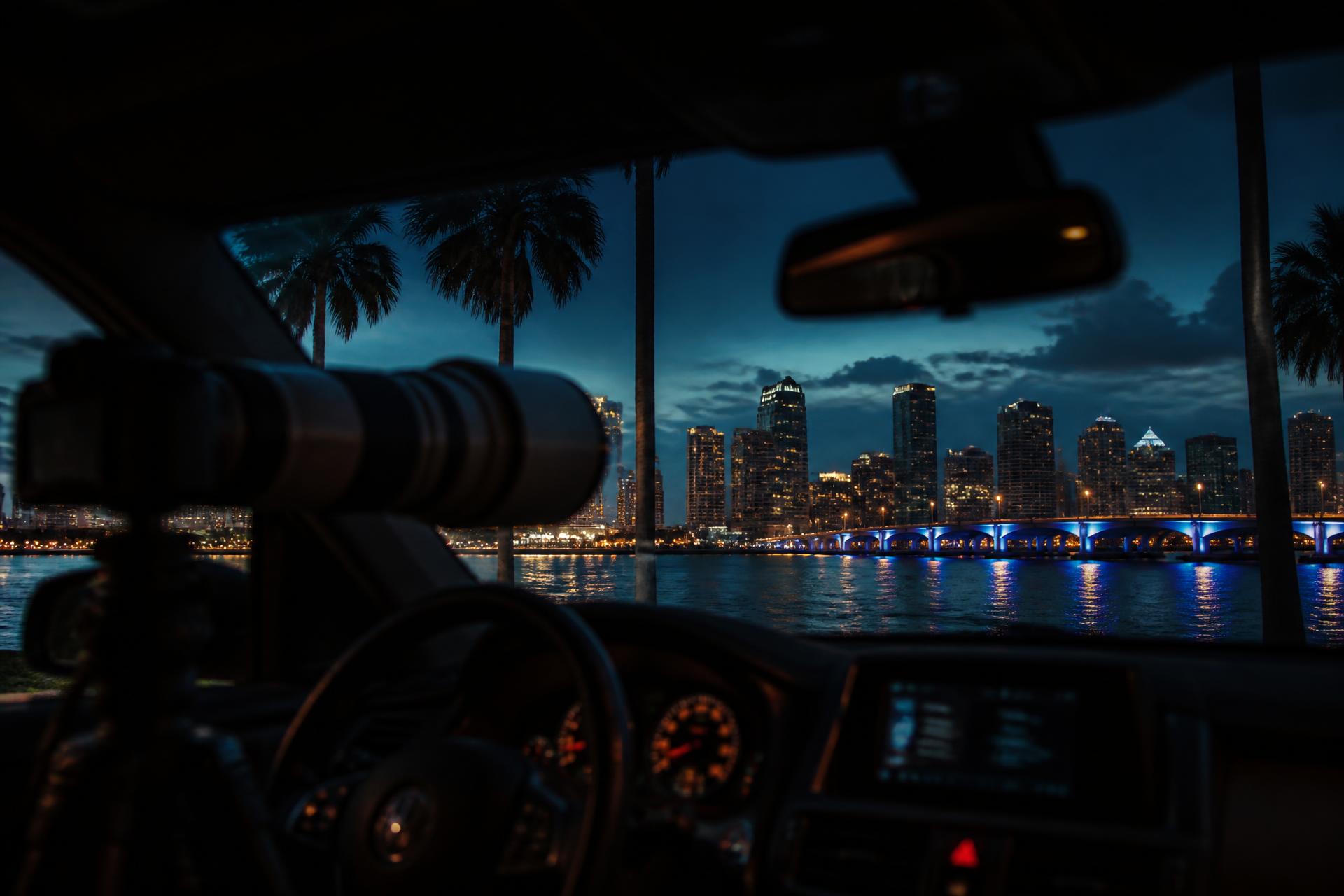 Surveillance camera set up inside a vehicle overlooking the downtown Tampa, Florida skyline at dusk